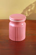 Pink ceramic storage jar with ribbed sides on wooden surface, luxury G Decor homeware
