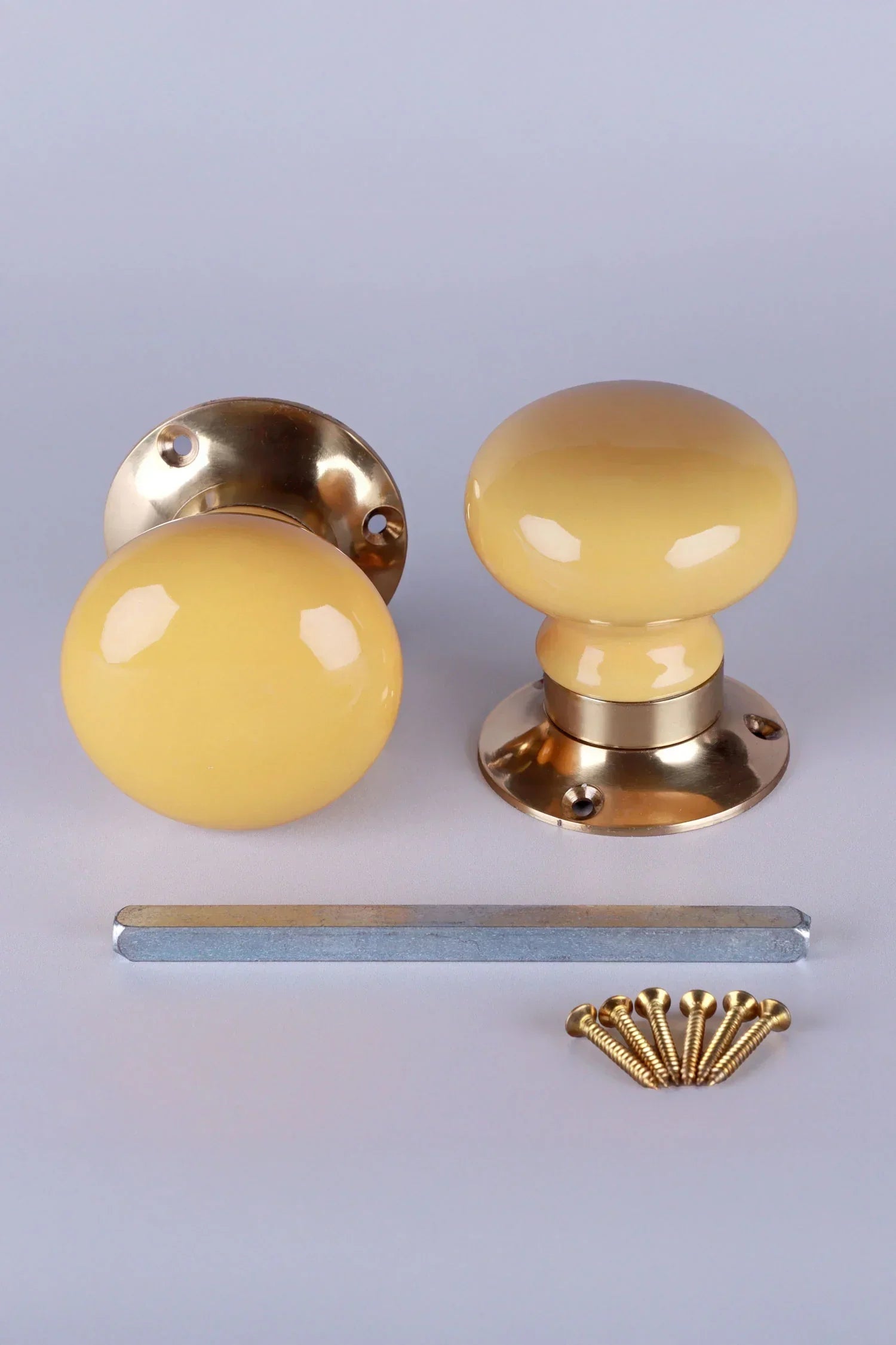 Brassworks Edit Sand Yellow Ceramic Mortice Door Knobs with Brass Base — lifestyle view, G Decor