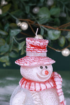Happy Snowman Christmas Candle with Red Hat and Scarf — lifestyle view, G Decor