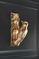 Gold bird-shaped decorative door handle on a dark panel, luxury home hardware by G Decor