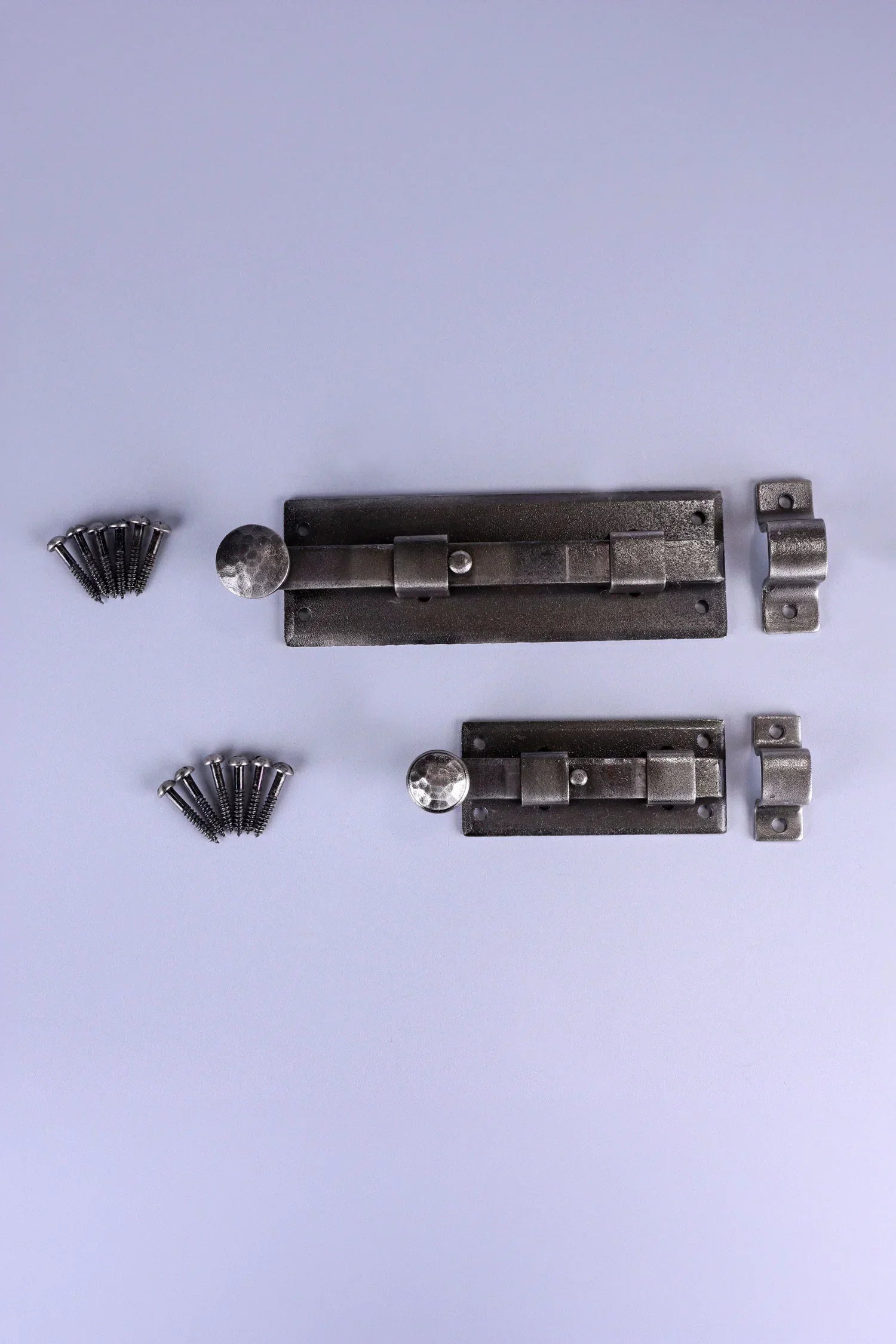 Hand-Forged Hammered Iron Sliding Door Bolt, Pewter — lifestyle view, G Decor