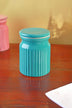 Turquoise ceramic kitchen jar with lid on wooden table, G Decor luxury home décor.