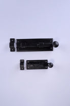 Hand-Forged Hammered Iron Sliding Door Bolt, Black — lifestyle view, G Decor