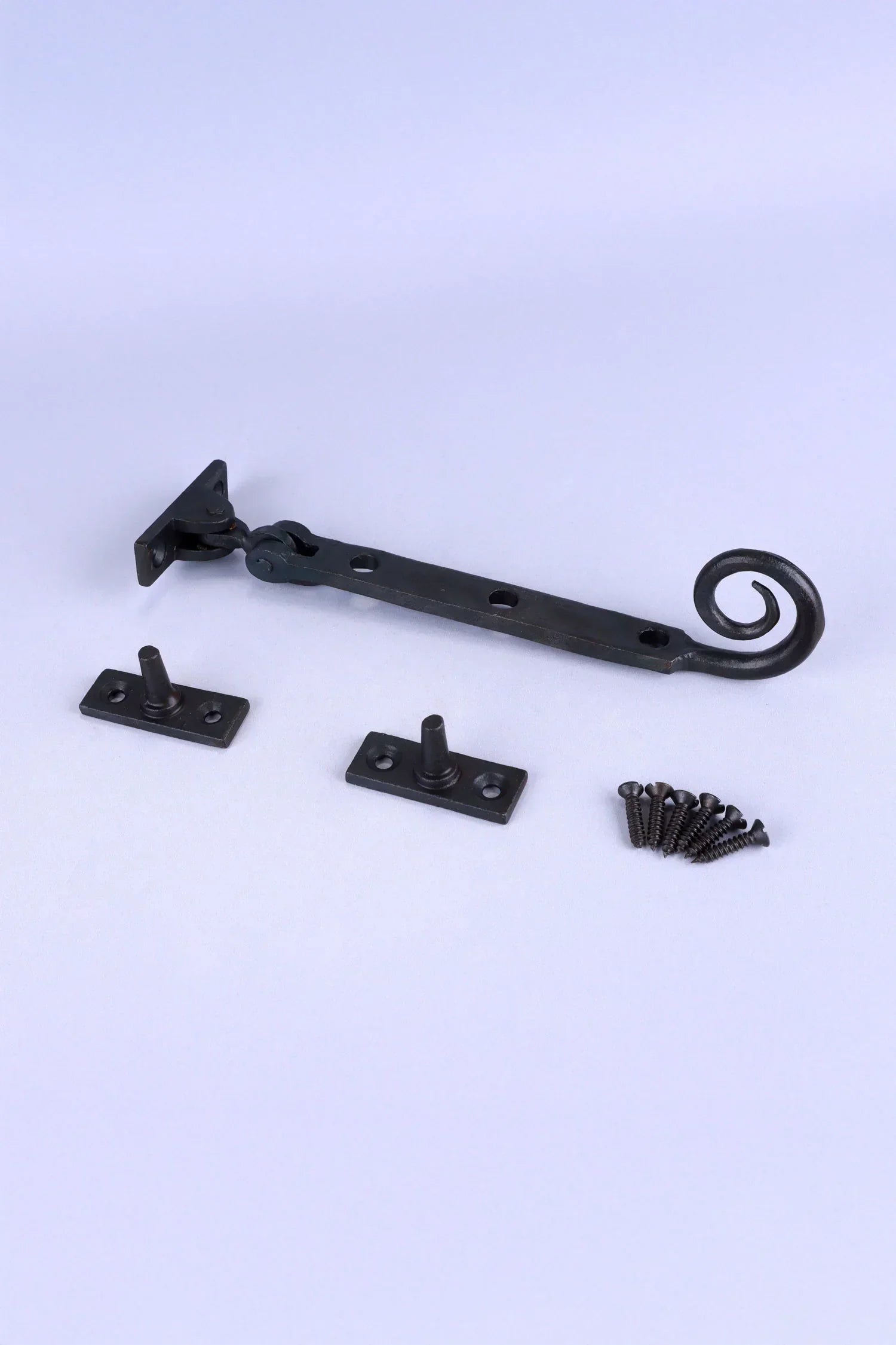 Hand-Forged Monkey Tail Window Stay, Beeswax — lifestyle view, G Decor