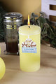 Yellow cotton wellness and beauty candle burning on a wooden table, G Decor home décor
