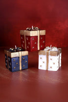 Gift Box Celebration Candle in Holiday Red Midnight Blue or Soft White — close-up view, G Decor