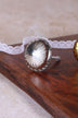 Runde Glastürknöpfe mit Rädern in Gold und Grau