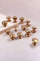 Aged brass cabinet knobs in thirteen styles, second view