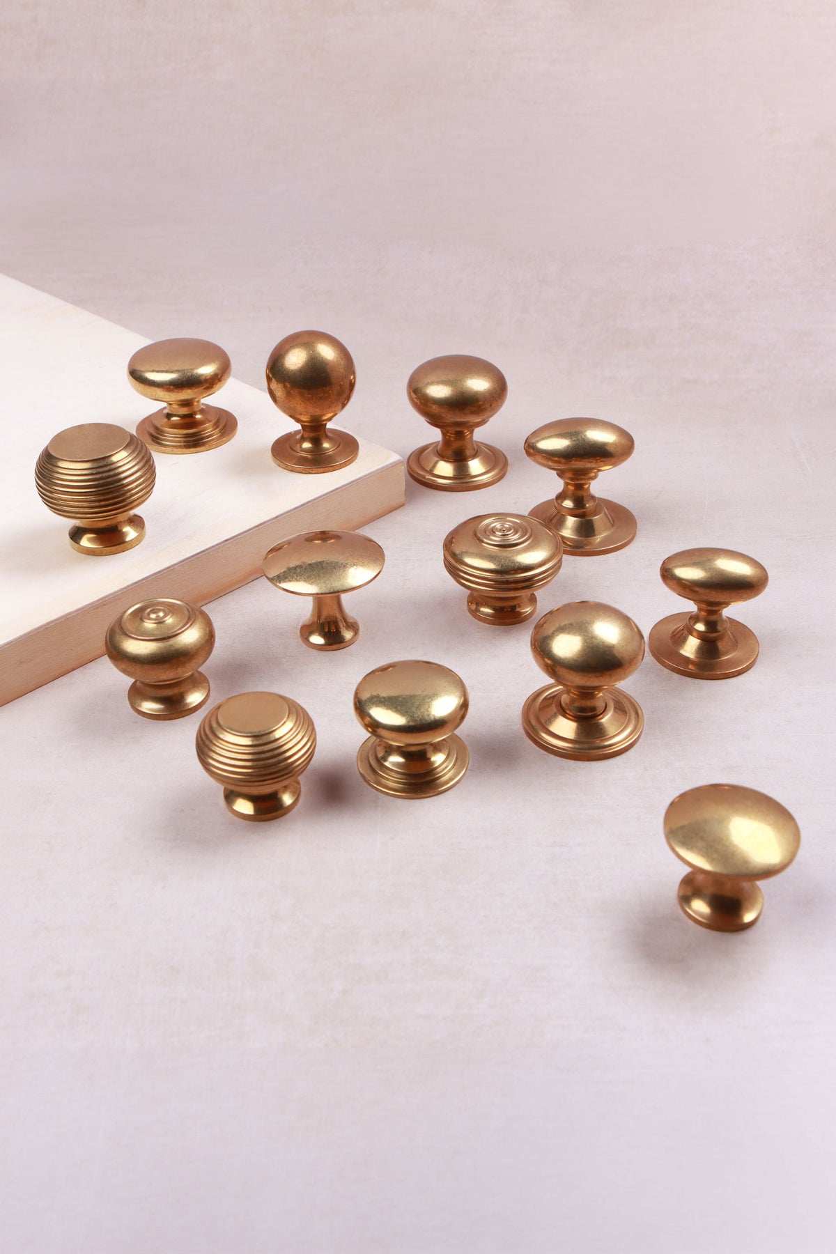 Aged brass cabinet knobs in thirteen styles, second view