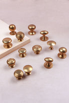 Aged brass cabinet knobs in thirteen styles, third view