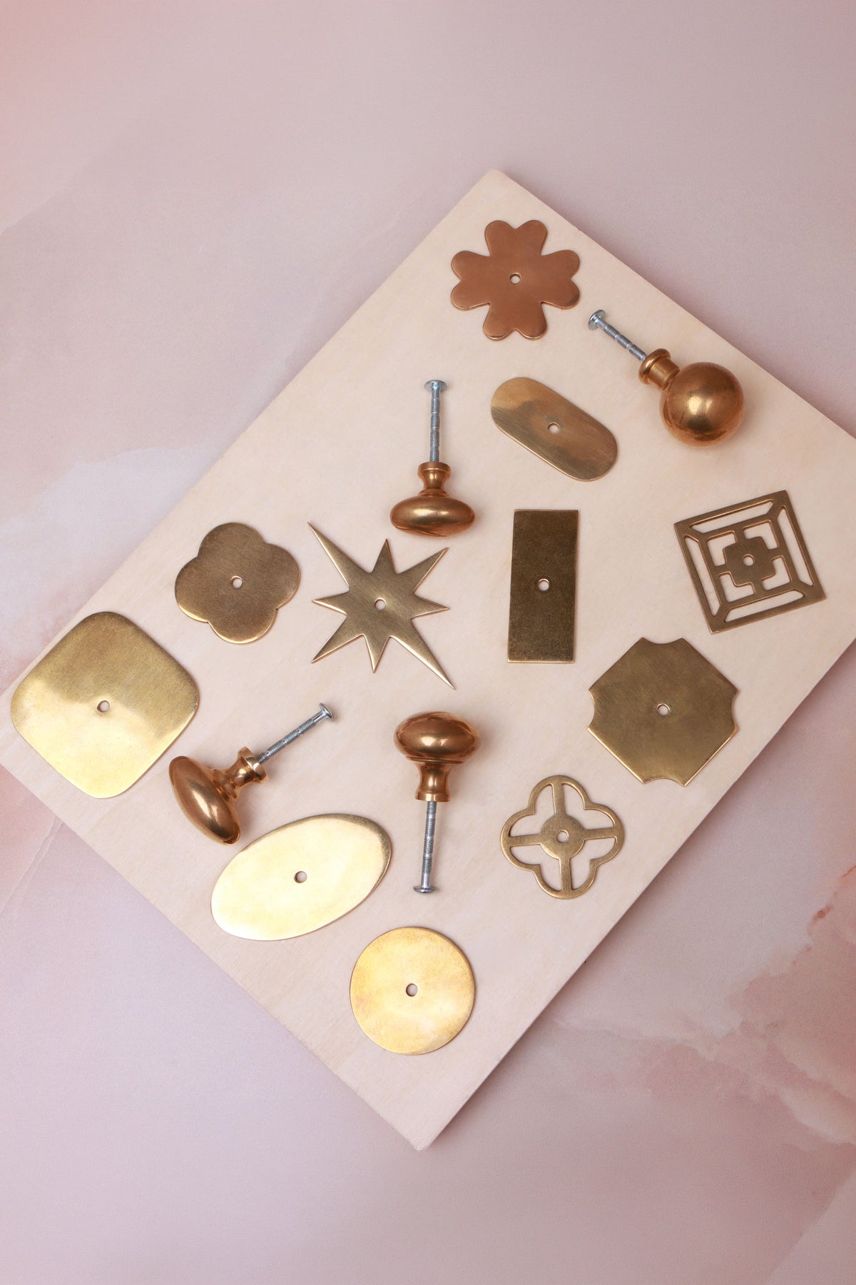 Cabinet knobs and backplates in aged brass, fourth view
