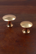 Flat-topped aged brass cabinet knobs, 38mm and 32mm