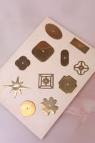 Solid brass knob backplates in aged brass