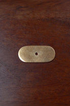 Oblong aged brass backplate with rounded ends, 54 by 25mm