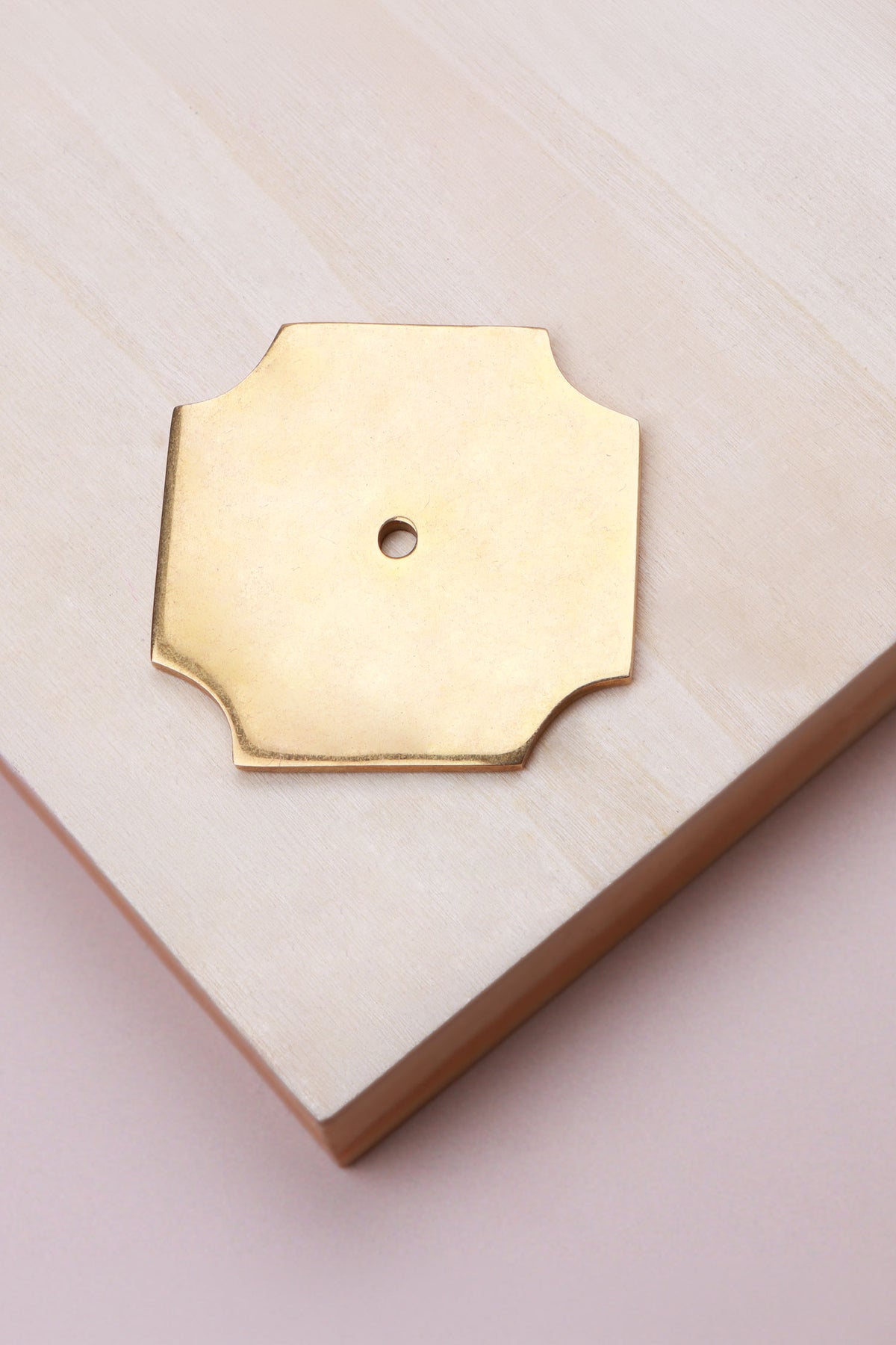 Aged brass square backplate, 50 x 50mm with scooped corners: solid brass with a 4mm centre hole for the knob bolt