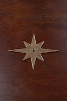 Eight-point star aged brass backplate, 87 by 68mm