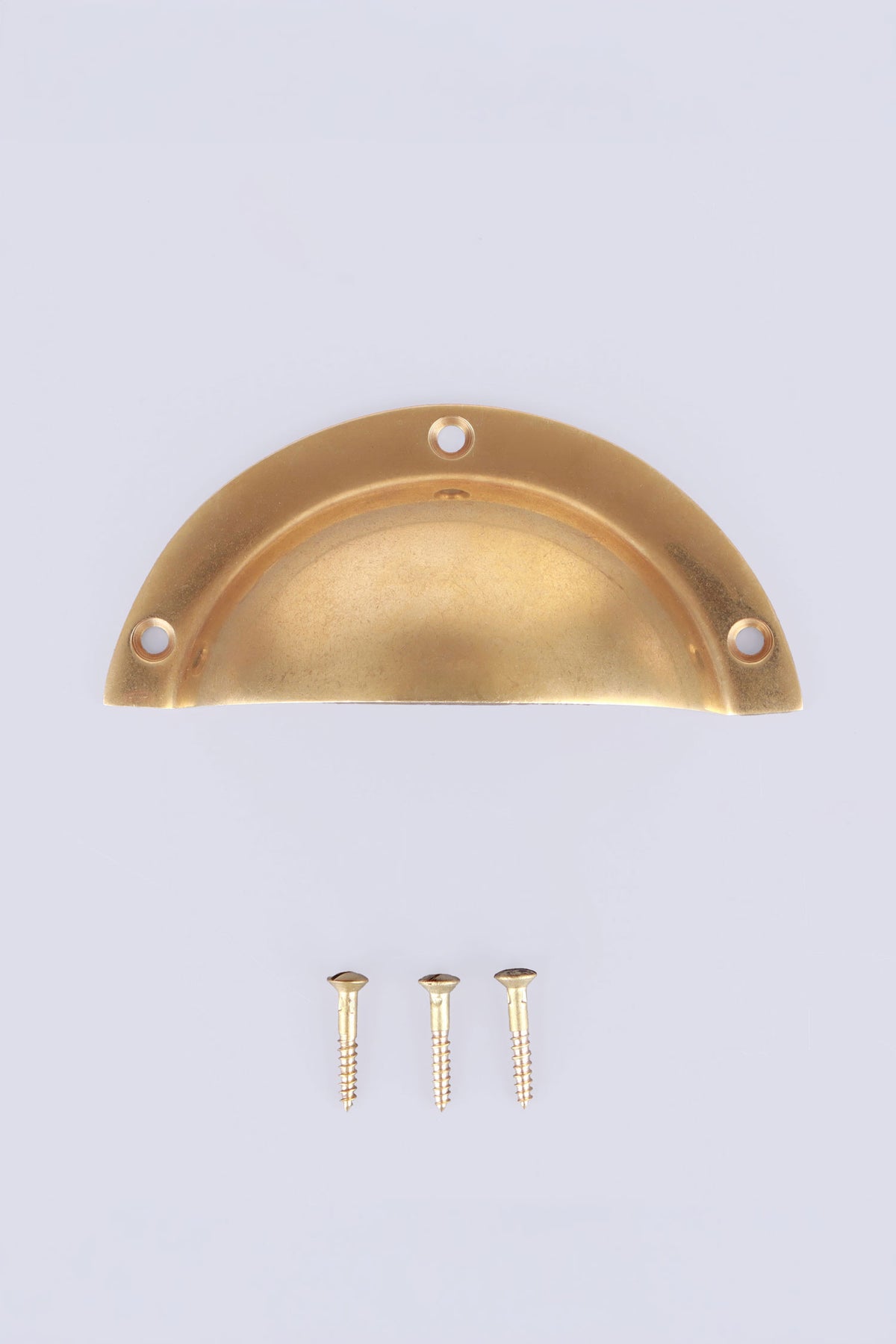 Stepped rim aged brass cup pull with its screws
