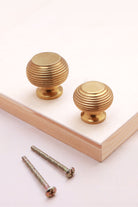 Beehive cabinet knob in aged brass, 32mm and 38mm, with solid brass fixing bolts