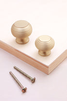 Beehive cabinet knob in satin brass, 32mm and 38mm, with solid brass fixing bolts