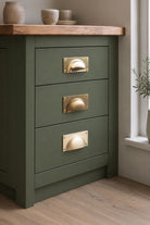 Bevelled plate cup pull in polished, aged and satin brass