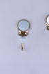 Blue-grey crackle glaze ceramic coat hook: pale blue-grey disc with fine crackle lines in a gold-tone frame, with a pale blue knob