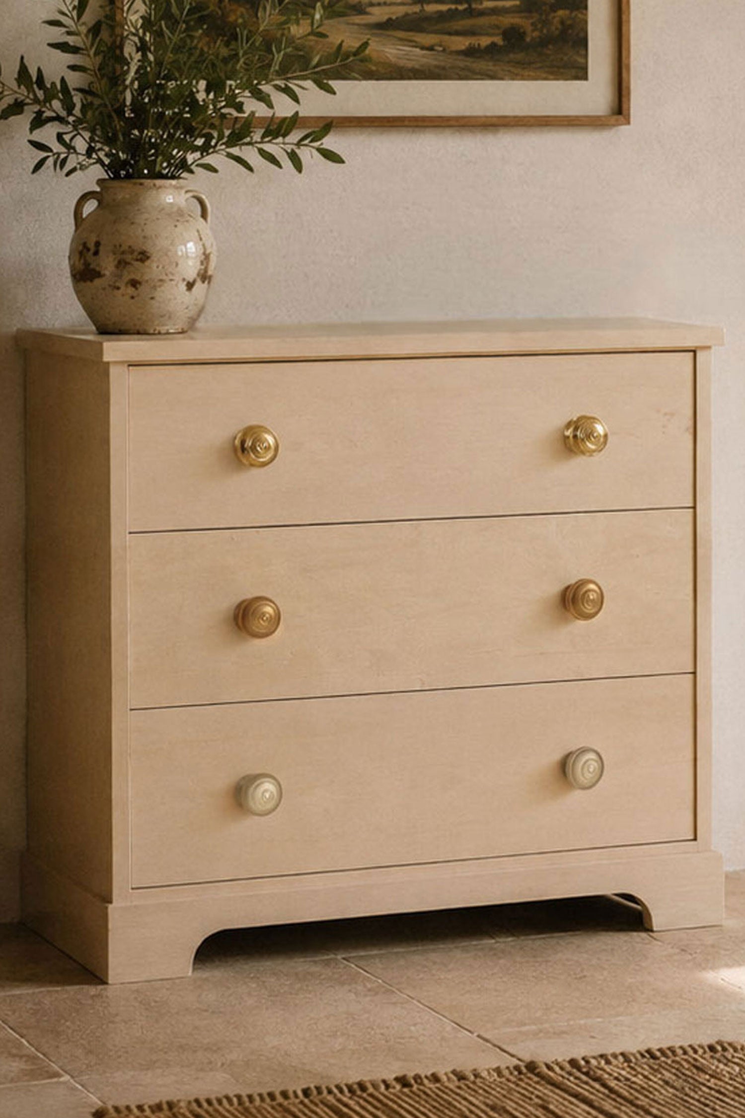 Bloxwich brass cabinet knobs on drawer fronts in a room setting
