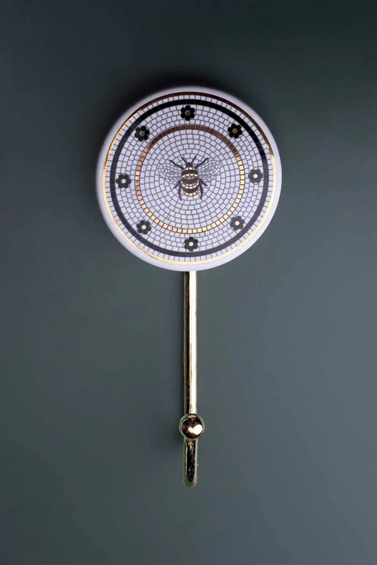 British Bee Tile Wall Hook in Black White and Gold with Brass — close-up view, G Decor