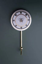 British Bee Tile Wall Hook in Black White and Gold with Brass — close-up view, G Decor