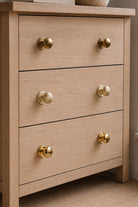 Bun cabinet knob in polished, aged and satin brass, second view
