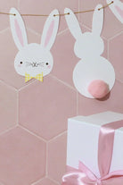 Bunny Bunting with White Rabbit Faces and Pom-Pom Tails — lifestyle view, G Decor