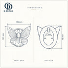 Size drawing of the brass butterfly door knocker: 106 mm (4.17 in) wide and 101 mm (3.98 in) tall; oval back plate 75 mm (2.95 in) tall; screw holes 27 mm (1.06 in) apart
