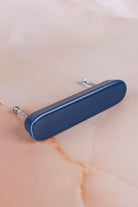 Cobalt blue ceramic bar handle, a deep glossy blue, with its two fixing bolts