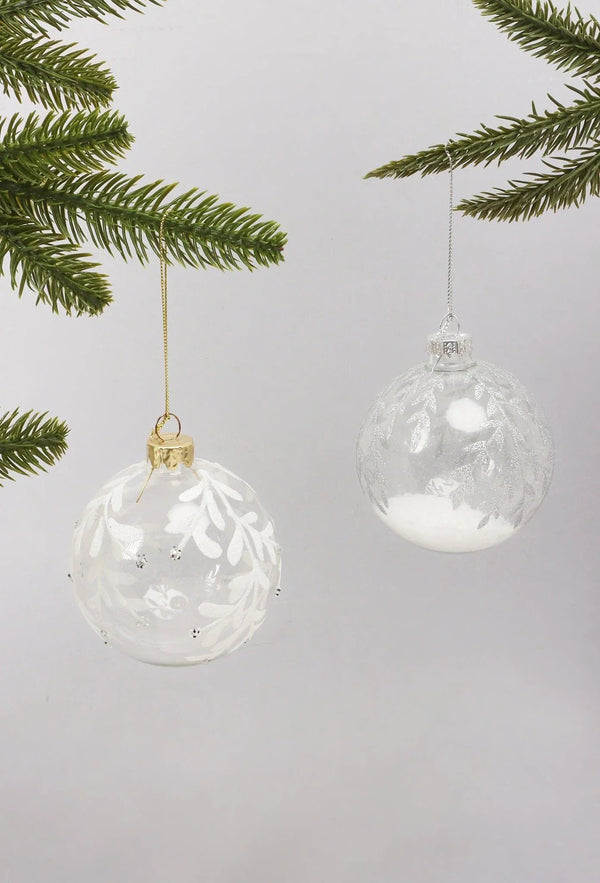 Boules de Noël en verre avec motifs végétaux scintillants