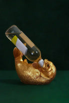 Brass Sculpted Wine Bottle Holder in Gold — close-up view, G Decor