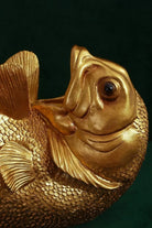 Brass Sculpted Wine Bottle Holder in Gold — lifestyle view, G Decor