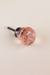 Blush Pink faceted glass ball cabinet knob, a soft rose tint, on an antique brass finish base with its fixing bolt