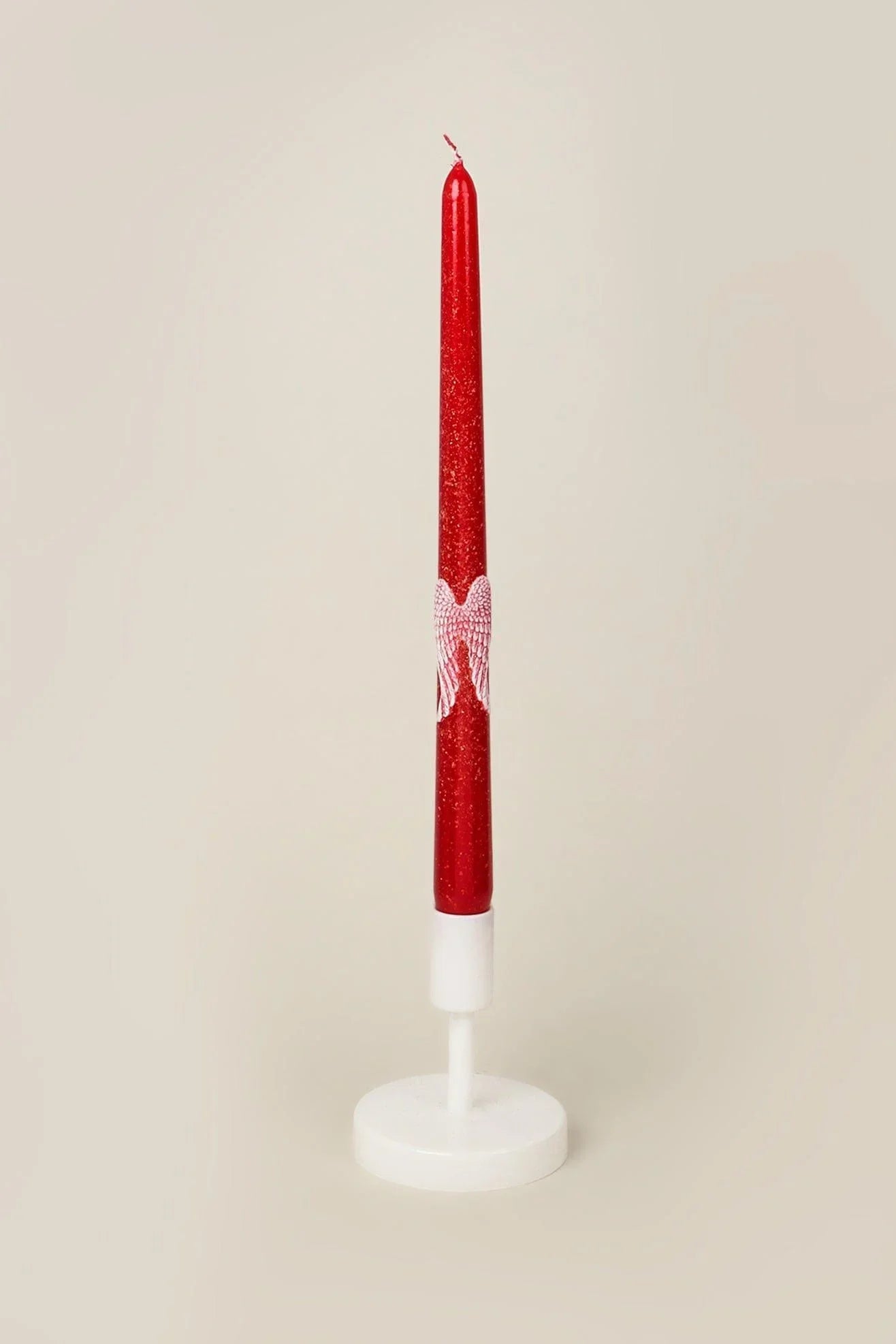 Featheré Wings Pair of Red Wax Taper Candles with Angel Wing Detail — close-up view, G Decor