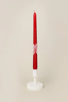 Featheré Wings Pair of Red Wax Taper Candles with Angel Wing Detail — close-up view, G Decor