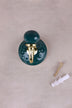 Dark green floral ceramic wall hook with a lacquered brass hook