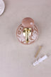 Dusky pink floral ceramic wall hook with a lacquered brass hook