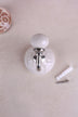 Cream floral ceramic wall hook with a chrome hook
