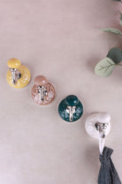 Floral ceramic wall hooks with chrome hooks, second view