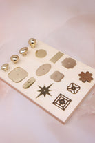 The solid brass backplate range laid flat in polished brass