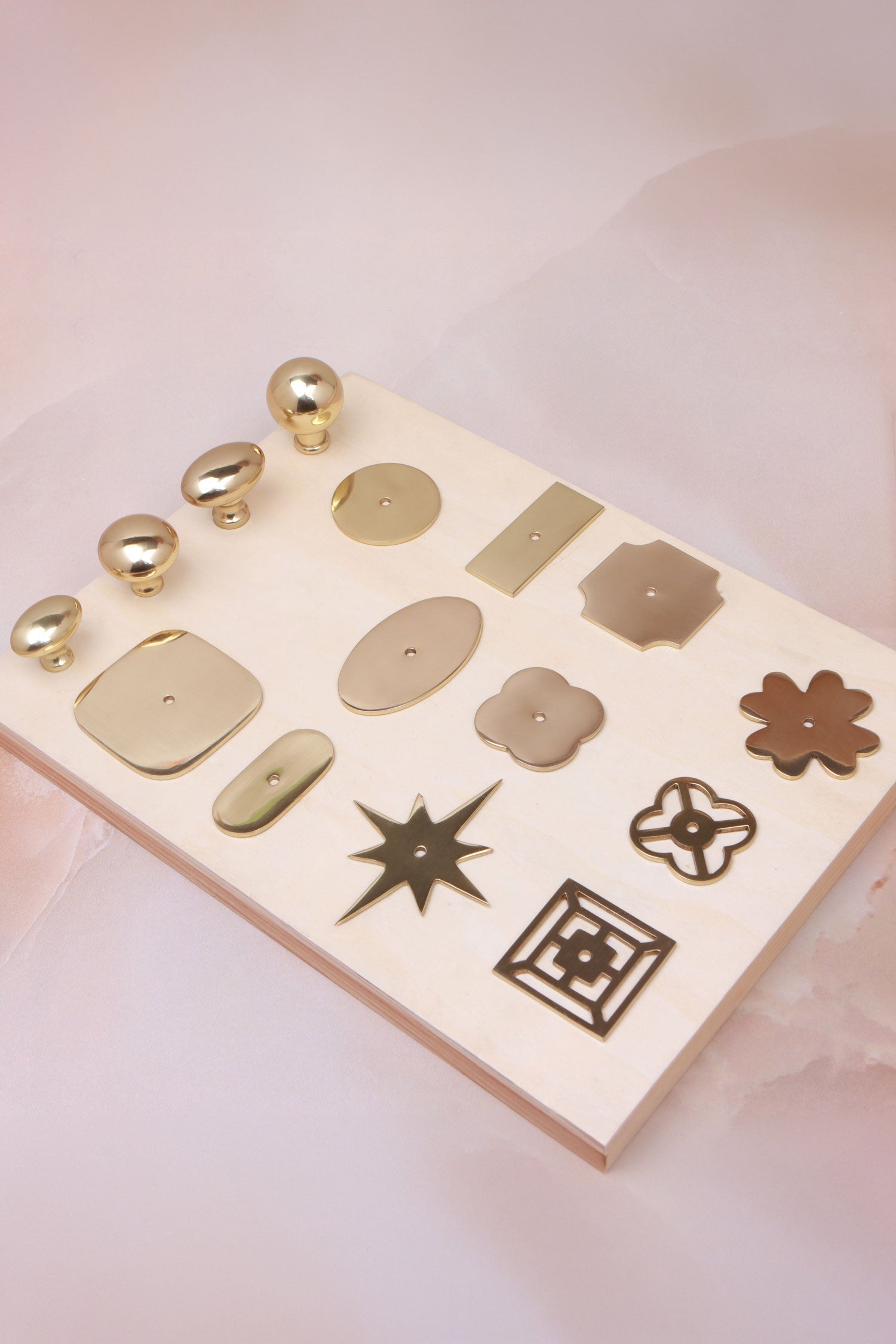 The solid brass backplate range laid flat in polished brass