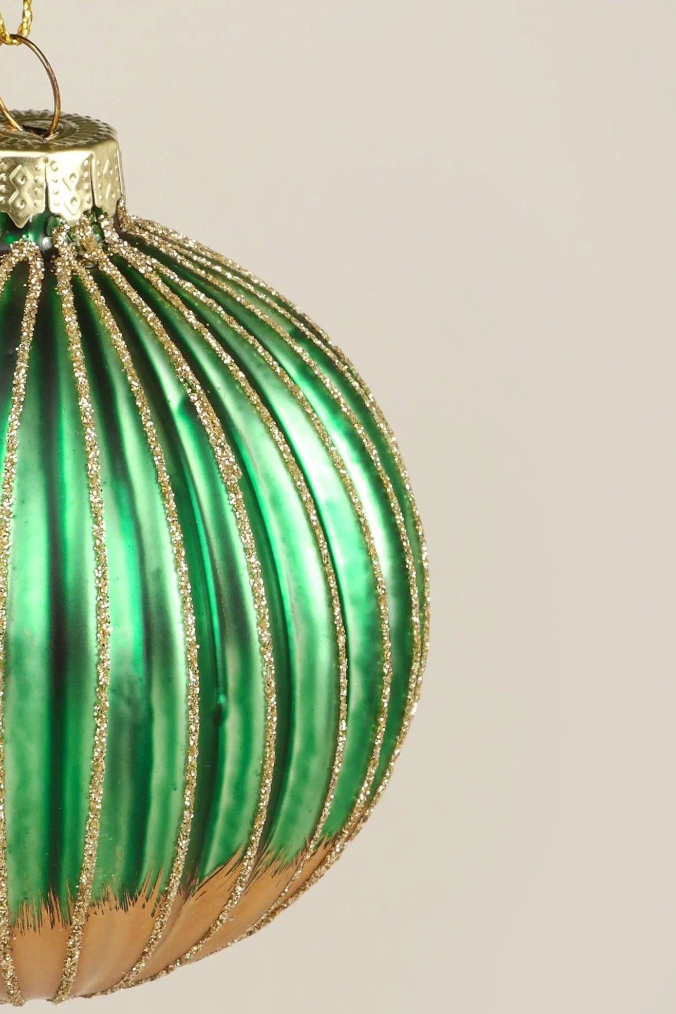 Green and Gold Ribbed Glass Christmas Tree Bauble — close-up view, G Decor
