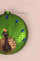 Hand-Blown Glass Majestic Peacock Christmas Bauble in Green — lifestyle view, G Decor