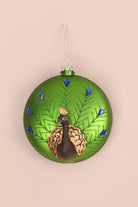 Hand-Blown Glass Majestic Peacock Christmas Bauble in Green — close-up view, G Decor