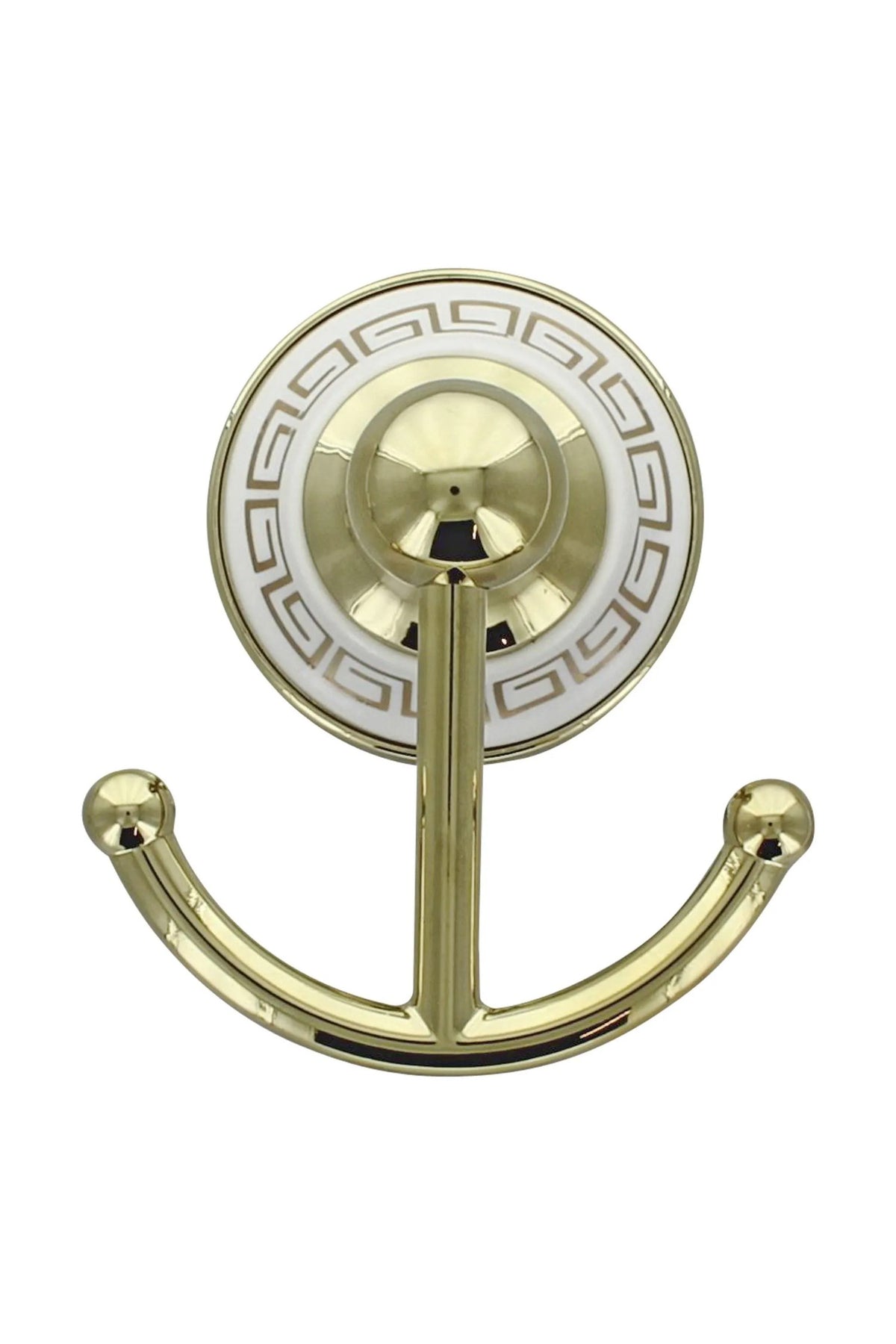 Close-up of the gold double robe hook on its white Greek key wall plate