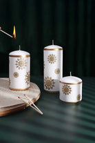 Golden Snowflake Pillar Candle with Gold Foil Trim and White Wax — G Decor