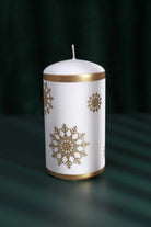 Golden Snowflake Pillar Candle with Gold Foil Trim and White Wax — lifestyle view, G Decor